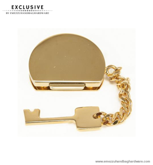 Handbag lock gold 45X35 mm.