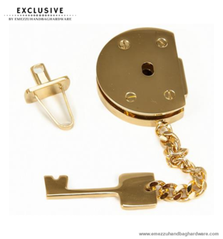 Handbag lock gold 45X35 mm.