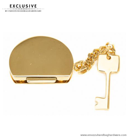 Handbag lock gold 45X35 mm.